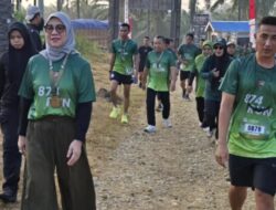 Herny Agus Ajak Warga Sehat Bersama di Fun Run Yonif TP 874